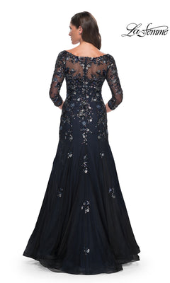 Back view of a woman wearing a Long Formal Dress: La Femme 30860, a floor-length navy blue mermaid gown with a sheer neckline, three-quarter sleeves, and floral sequin embellishments.