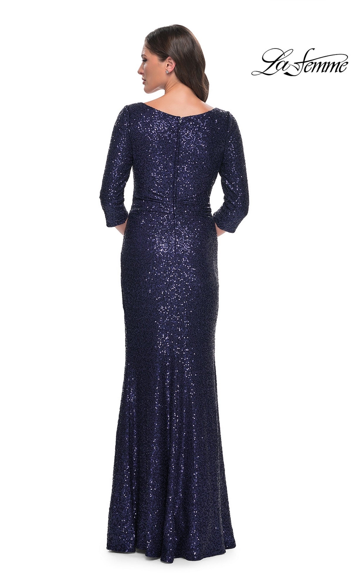 A woman viewed from behind wearing a floor-length, navy sequin Long Formal Dress: La Femme 30879 with three-quarter length sleeves.