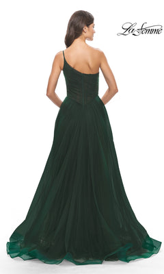 A woman in a dark green One-Shoulder Sheer-Bodice Prom Ball Gown 31069 stands facing away, showcasing the gown’s elegant back details against a white background.