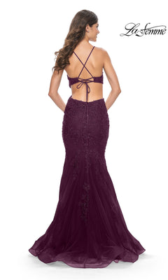 Back view of a deep purple La Femme 31132 mermaid gown featuring a tulle skirt, a lace-up bodice, and floral embroidery with beaded lace appliques.