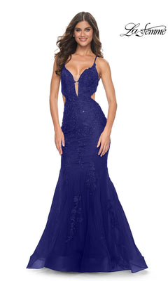 La Femme 31132 is a marine blue sleeveless floor-length gown with a plunging neckline, waist cutouts, and beaded lace appliques on a mermaid tulle skirt.