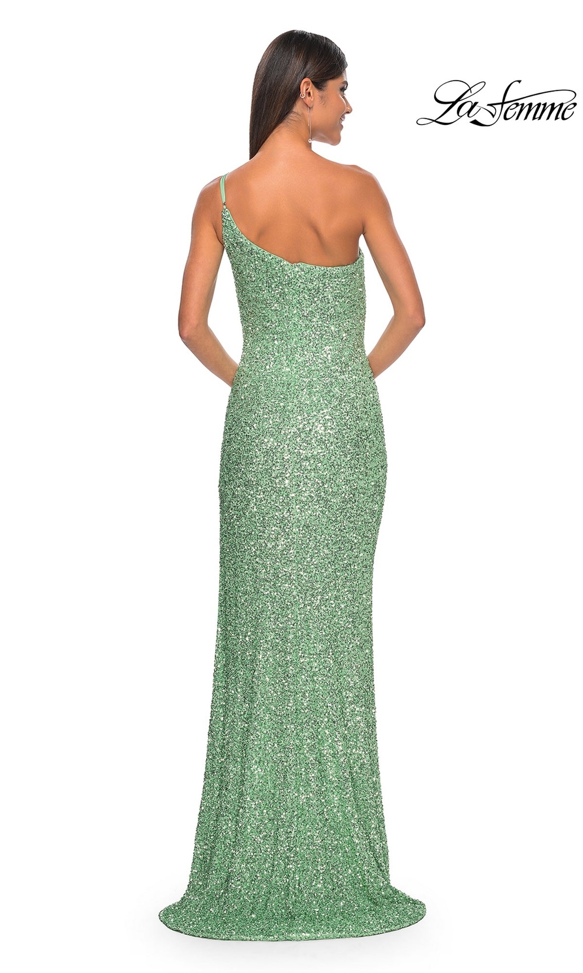 A woman stands with her back to the camera against a white background, wearing the floor-length One-Shoulder La Femme Sequin Prom Dress 31212 in green.