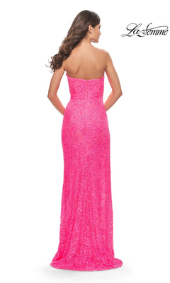 Back view of a Long Prom Dress: La Femme 31351, featuring a strapless, floor-length hot pink beaded lace design with sequin embellishments and a high-leg side slit.