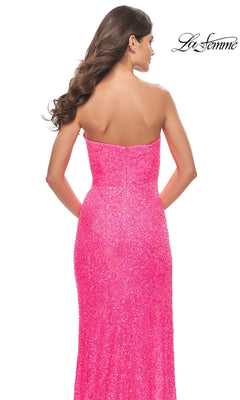 Back view of a hot pink, strapless, floor-length beaded lace Long Prom Dress: La Femme 31351 with sequin embellishments and a high-leg side slit.