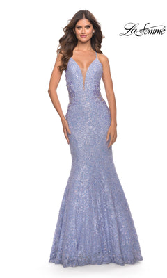 A woman models the La Femme Long Lace Mermaid Prom Dress 31354 in light purple, featuring embellishments, a deep V neckline, and thin straps, standing before a plain white background with the La Femme logo in the top right corner.