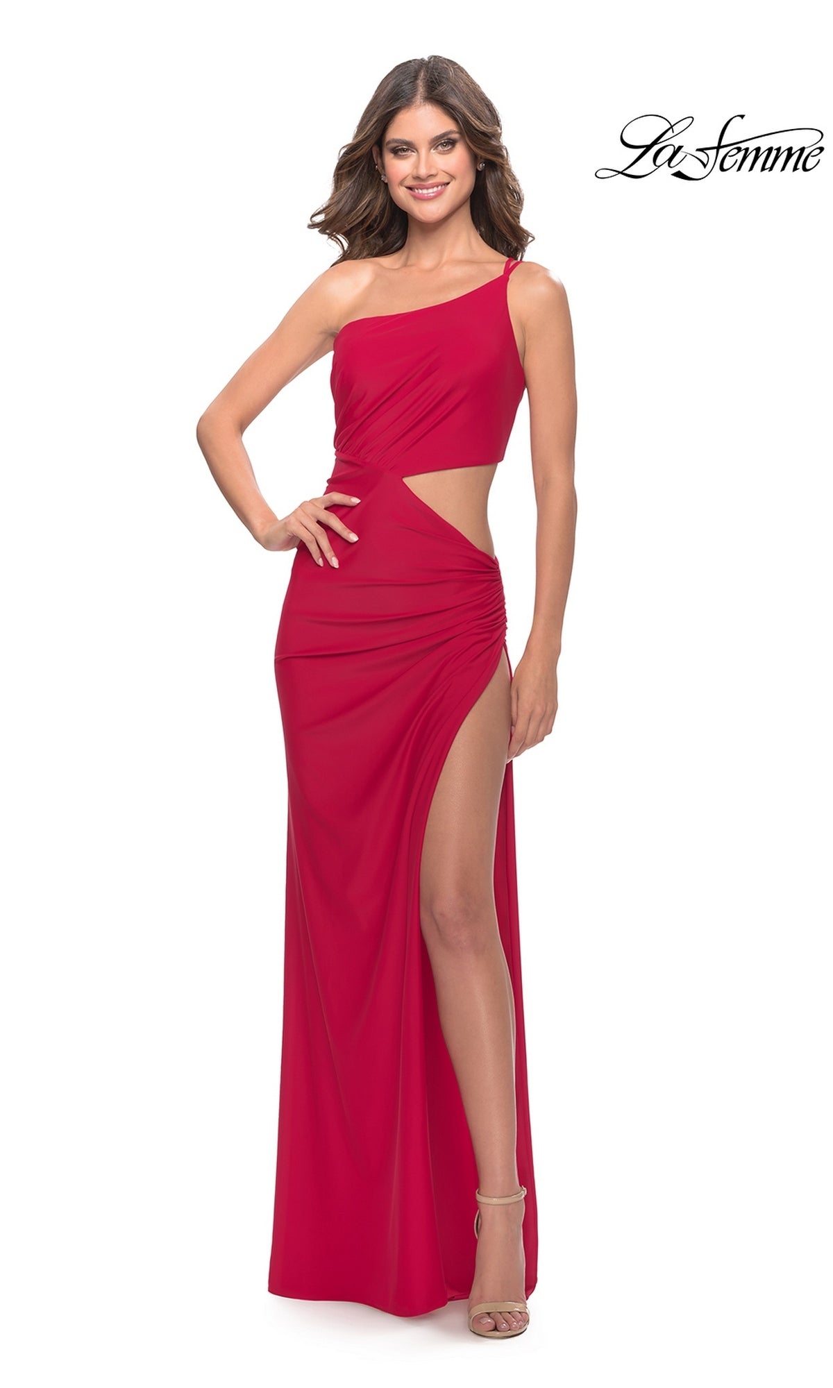A woman wearing a red, one-shoulder floor-length cutout Long Prom Dress: La Femme 31386 with a side slit.