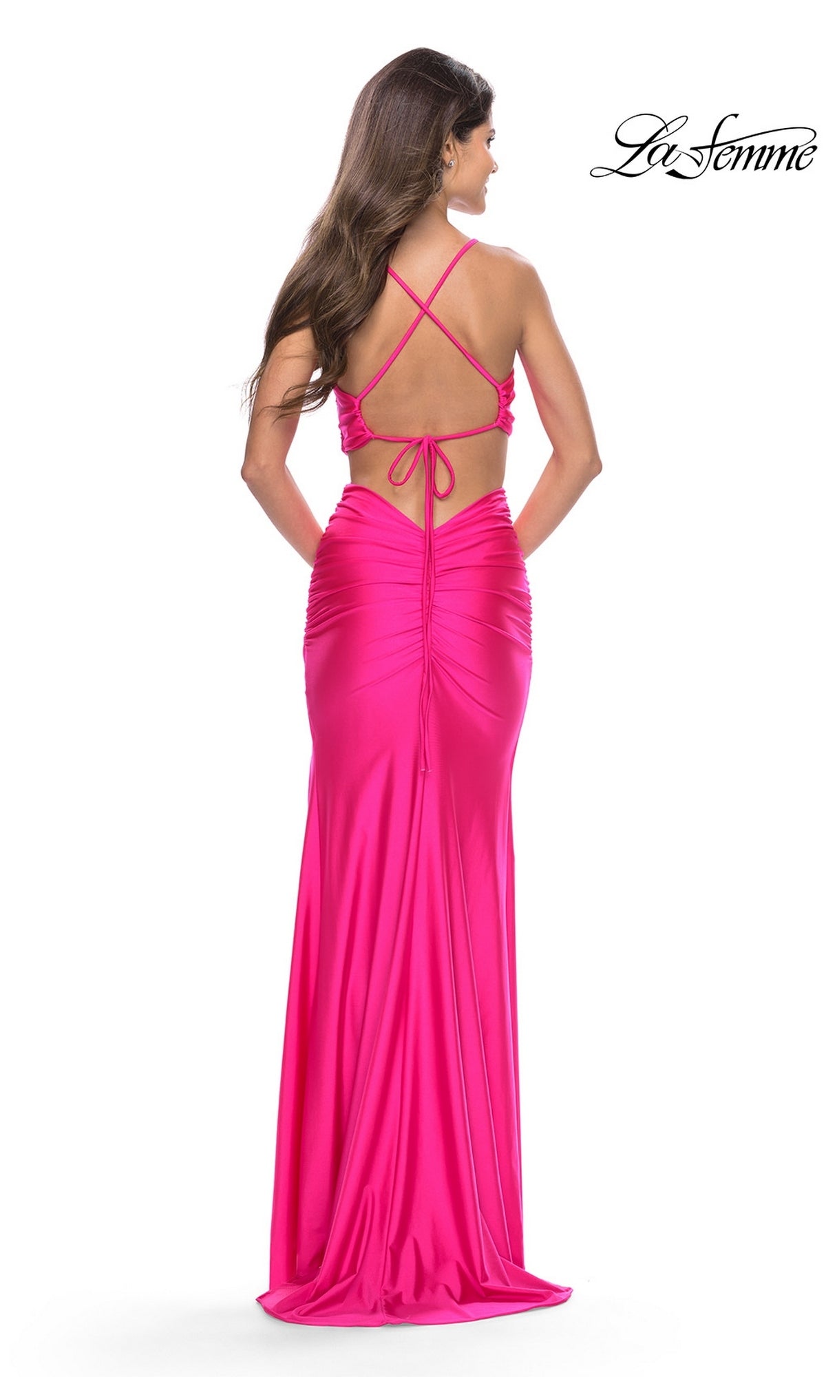 Back view of a hot pink La Femme 31400 jersey prom dress with a cutout bodice and lace-up straps.