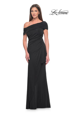 A woman wears a black, floor-length, off-the-shoulder Long Formal Dress: La Femme 31459 with draped fabric at the waist.