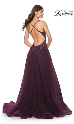 A woman models the La Femme Beaded-Bodice Long A-Line Prom Gown 31471—floor-length, deep purple with an open back, crisscross straps, and sequin waist—against a white background. La Femme logo appears in the corner.