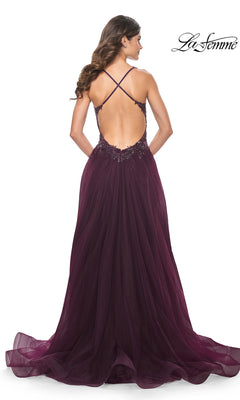 Woman wearing the La Femme Beaded-Bodice Long A-Line Prom Gown 31471, a floor-length deep purple dress with a low back, crisscross straps, and flowing tulle skirt, photographed from behind.