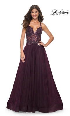 A woman smiles in the La Femme Beaded-Bodice Long A-Line Prom Gown 31471, featuring a sleeveless deep purple v-neck, sequined bodice, and full tulle skirt. The "La Femme" logo is visible in the top right corner.