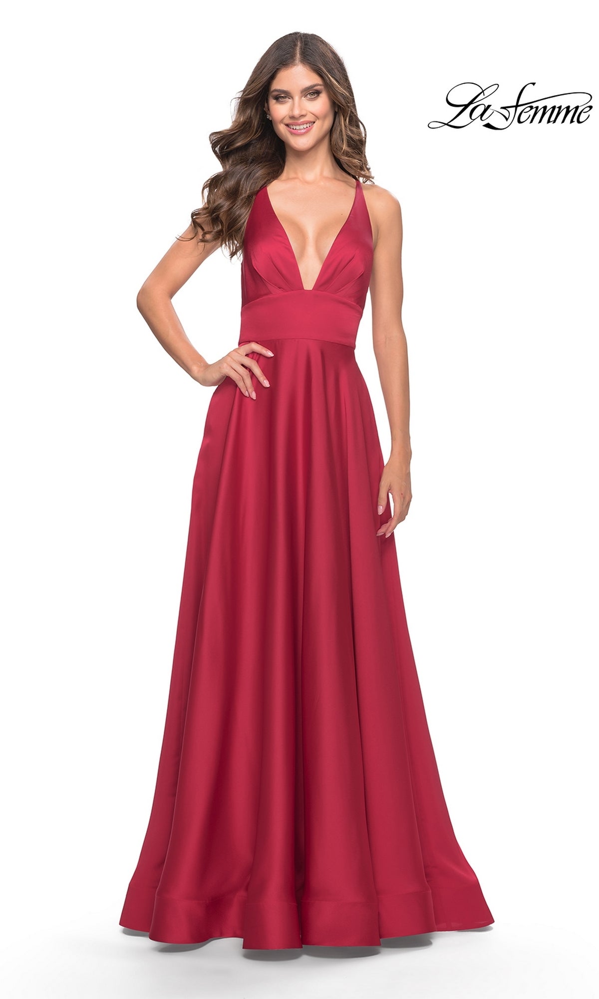 Woman in the La Femme 31533 Deep V-Neck Long A-Line Prom Dress with a fitted waist and full skirt, smiling against a white background featuring the 