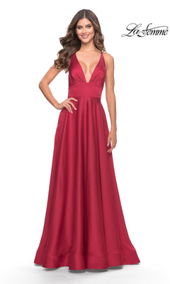 Woman in the La Femme 31533 Deep V-Neck Long A-Line Prom Dress with a fitted waist and full skirt, smiling against a white background featuring the "La Femme" logo.