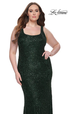 A woman models the La Femme Long Prom Dress 31605, a dark green sequined sleeveless formal gown, posing against a white background with the "La Femme" logo in the top right corner.