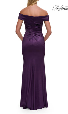 Back view of the Long Formal Dress: La Femme 31621, a floor-length, dark purple off-the-shoulder stretch-satin evening gown with a ruched bodice and a fitted silhouette.