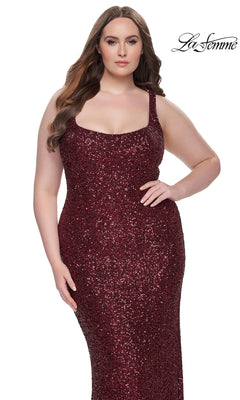 A woman wears the sleeveless, fitted La Femme Long Prom Dress 31630 in red sequins, posing against a white background with the "La Femme" logo in the top right corner.