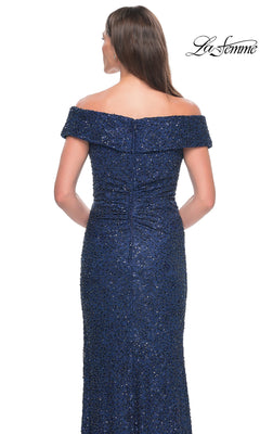 Back view of the navy blue, off-the-shoulder Long Formal Dress: La Femme 31679, a floor-length style featuring intricate beaded lace embroidery.