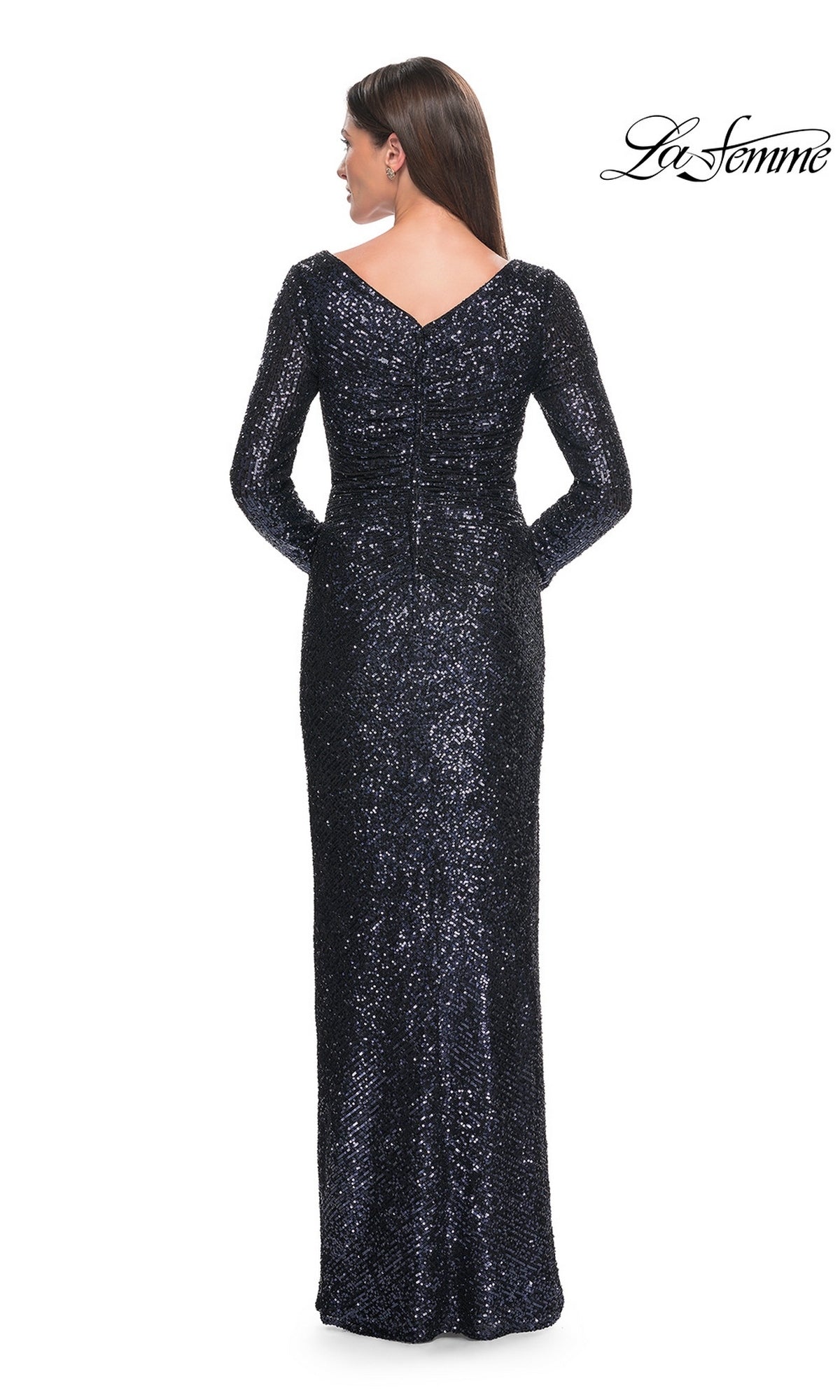Back view of a woman in a Long Formal Dress: La Femme 31698, a fitted, floor-length, long-sleeve, navy blue sequin dress with a V-neckline.