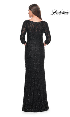 Back view of the floor-length black beaded lace La Femme 31721 formal dress, featuring three-quarter sleeves and a boat neckline.