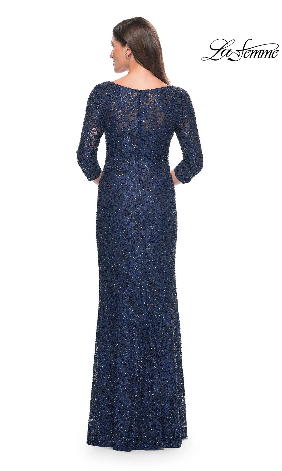 Back view of a woman wearing a La Femme 31721 floor-length, three-quarter sleeve navy blue lace gown with a boat neckline.