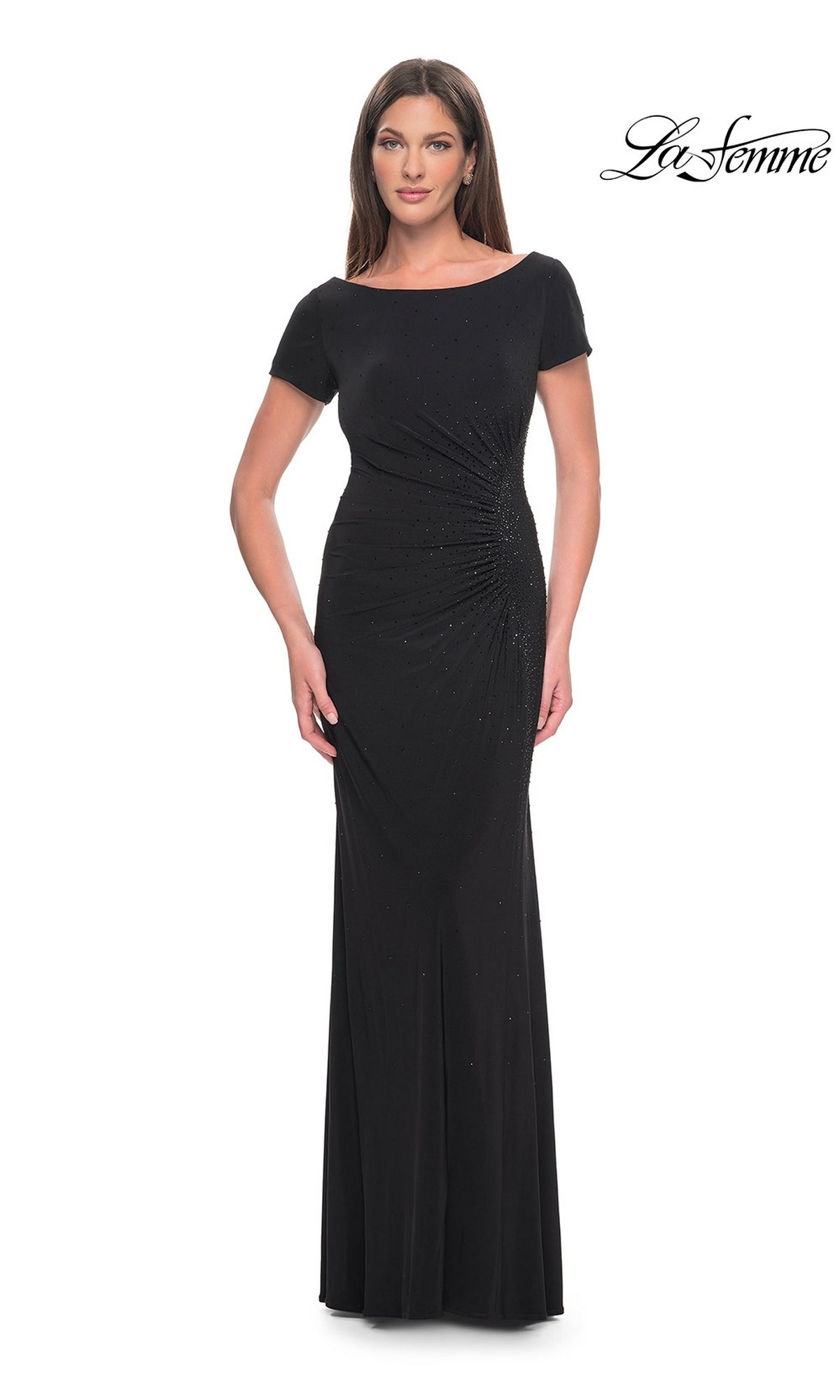 A woman wearing a black Long Formal Dress: La Femme 31773, a long jersey formal dress with short sleeves and side ruching.