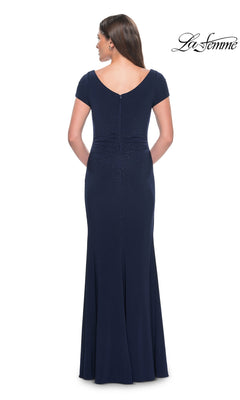 Back view of a Long Formal Dress: La Femme 31773, a dark blue jersey gown with cap sleeves and subtle sparkling embellishments.