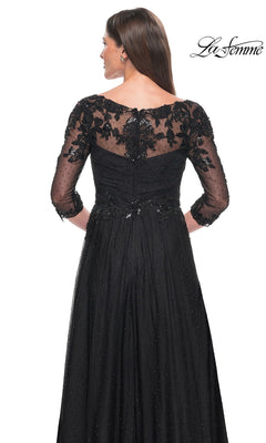 Back view of the Long Formal Dress: La Femme 31776, a black beaded evening gown featuring three-quarter sleeves, a sheer embellished bodice, and a full skirt with subtle polka-dot detail.