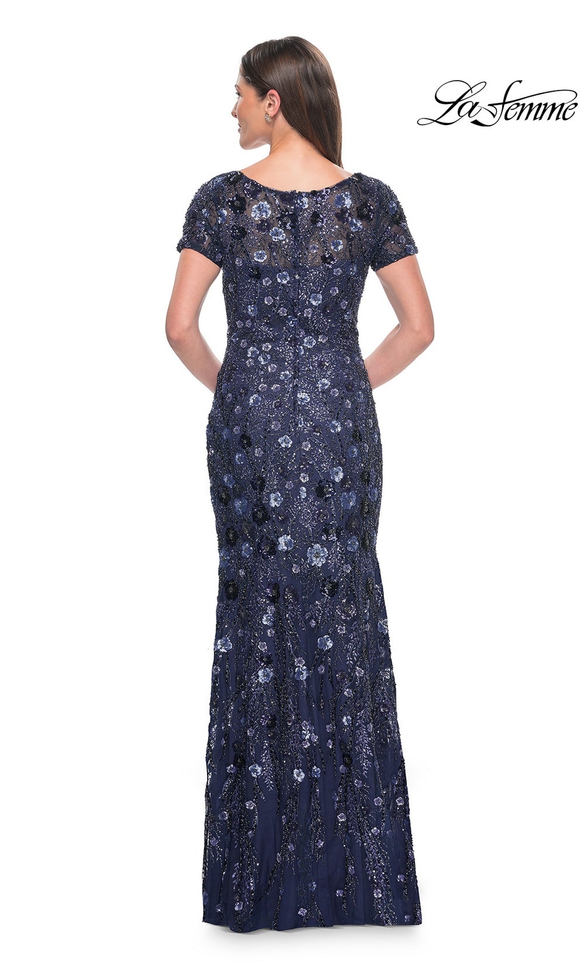Back view of the Long Formal Dress: La Femme 31779, a floor-length navy gown with short sleeves, sequins, and floral beading.