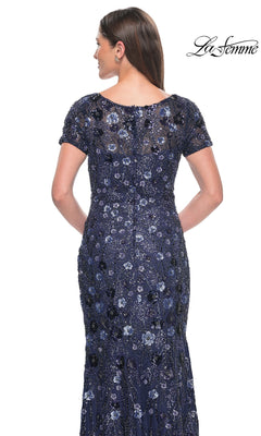 Back view of the Long Formal Dress: La Femme 31779, a floor-length navy gown featuring short sleeves and intricate floral beadwork and sequins.