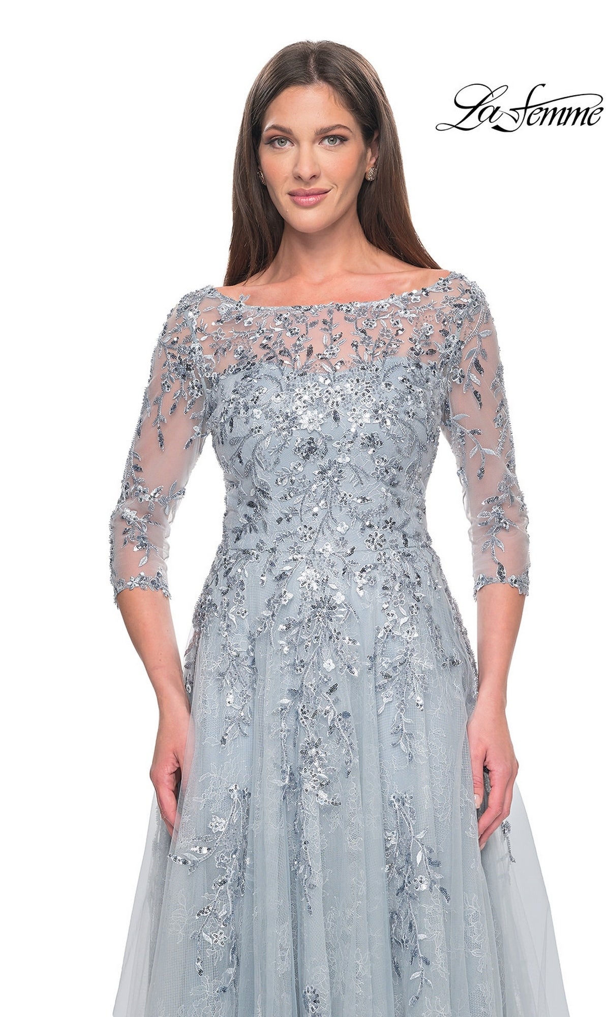 La Femme 31795 light gray beaded tulle formal dress with three-quarter sleeves, a boat neckline, and intricate silver floral embroidery and sequins.