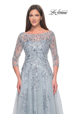 La Femme 31795 light gray beaded tulle formal dress with three-quarter sleeves, a boat neckline, and intricate silver floral embroidery and sequins.