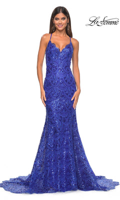 A woman wears the La Femme Sequin-Print Long Prom Dress 31865, a fitted, floor-length royal blue gown with a plunging neckline and thin straps, standing against a white background.