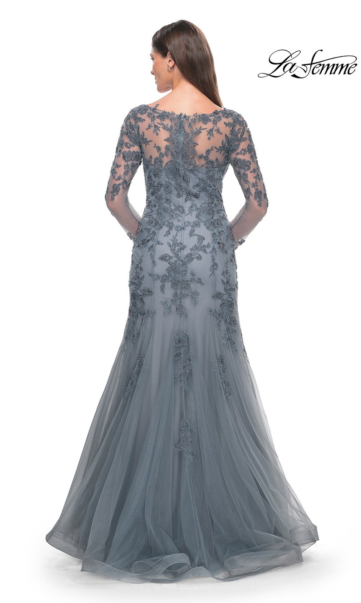 Back view of the grey Long Formal Dress: La Femme 31887, featuring a long-sleeved bodice with beaded lace appliques that transitions into a flowing skirt.
