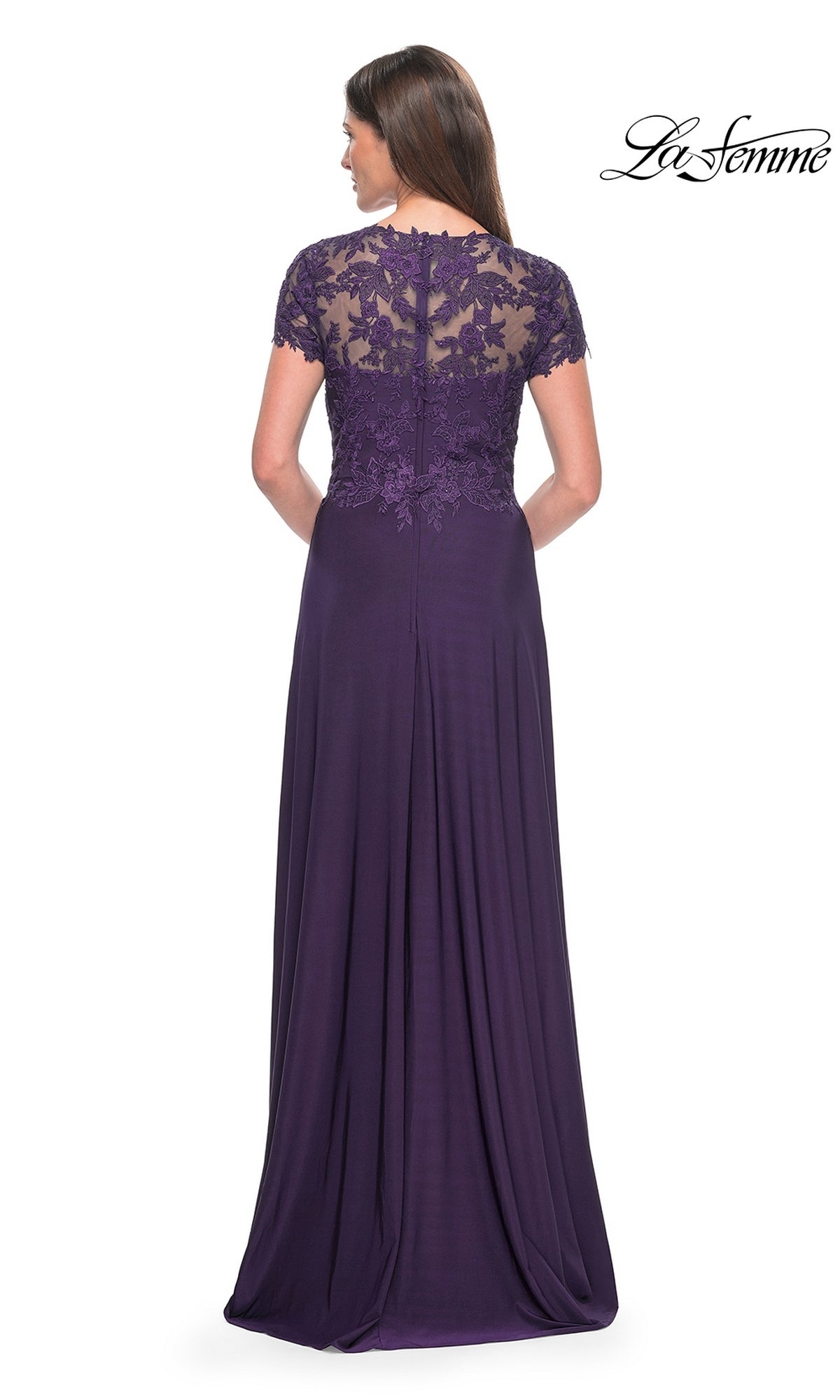 A woman faces away from the camera in the La Femme Cap Sleeve Long Purple Prom Dress 31906, featuring eggplant lace detailing on the upper back and sleeves, a zipper closure, and a flowing A-line skirt.