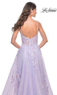 A woman is shown from the back wearing the La Femme Embroidered-Lace Long Prom Dress 31939, featuring lavender tulle, floral embroidery, spaghetti straps, a fitted bodice, and an elegant flowing skirt.