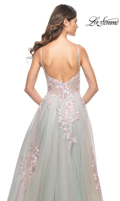 A woman is seen from the back in the La Femme Embroidered-Lace Long Prom Dress 31939, featuring thin straps, pastel pink floral embroidered lace, a sheer bodice, and flowing skirt, standing against a white background.