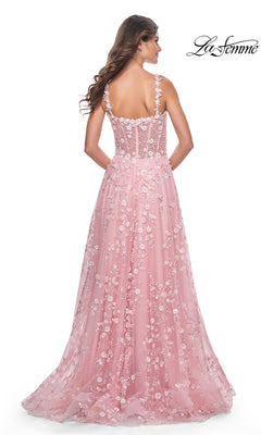 A woman is shown from the back in the La Femme Floral-Embellished Long Prom Dress 31996, featuring pink floral embroidery, sheer straps, and a fitted bodice.
