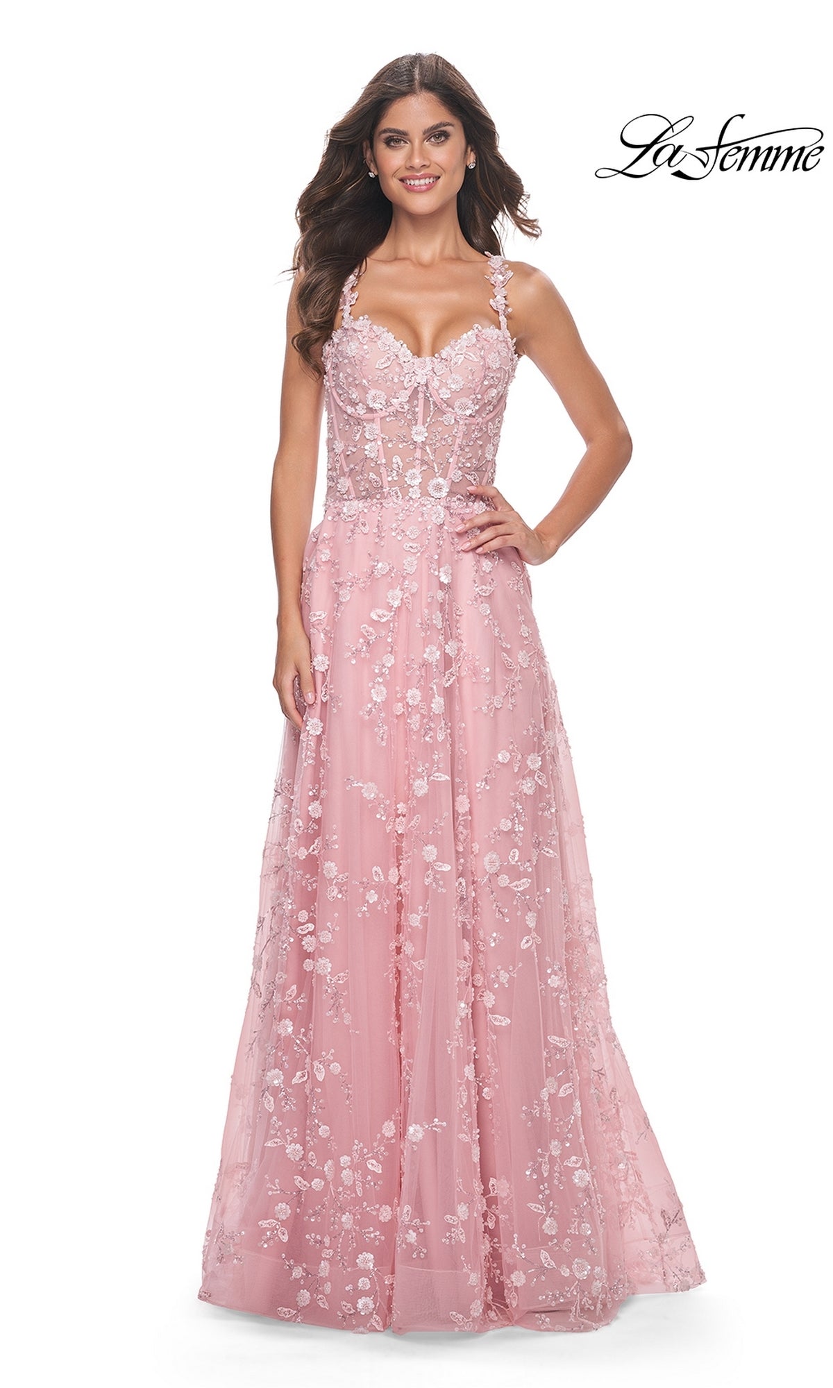 A woman poses in the La Femme Floral-Embellished Long Prom Dress 31996 with spaghetti straps, smiling against a white background. The La Femme logo appears in the top right corner.