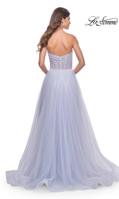 A woman with long hair is seen from the back wearing the La Femme Strapless Long Prom Ball Gown 31997 in lavender tulle, with a fitted bodice and flowing A-line skirt. The La Femme logo appears in the top right corner.