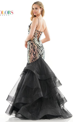 A woman poses with one arm on her waist wearing the Sequin-Print Long Mermaid Prom Dress 3200, featuring a corset-style sequined bodice, lace-up back, and layered black tulle mermaid skirt.