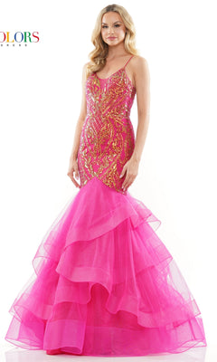 A woman poses against a plain white background in the Sequin-Print Long Mermaid Prom Dress 3200, featuring bright pink sequins, gold accents, a layered tulle skirt, and a flattering corset-style bodice.