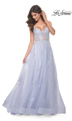A woman wears the La Femme Sheer-Corset Long A-Line Prom Dress 32028 in light lavender with embroidered lace, open back, sheer bodice, and floor-length A-line silhouette against a plain white background.