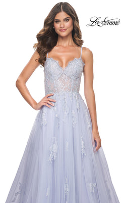A woman wears the La Femme Sheer-Corset Long A-Line Prom Dress 32028, featuring thin straps and an embroidered lace bodice, standing against a white background. The La Femme logo appears in the top right corner.