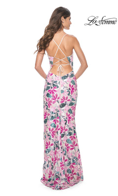 A woman is seen from behind wearing the La Femme Sequin-Floral Long Prom Dress 32050, featuring a floral print, open back, and crisscross straps. The "La Femme" logo appears in the top right corner.