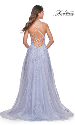 A woman faces away in the La Femme Embroidered-Lace Long Prom Dress 32062, featuring light purple floral embroidery, a crisscross strappy open back, and the "La Femme" logo in the top right corner.