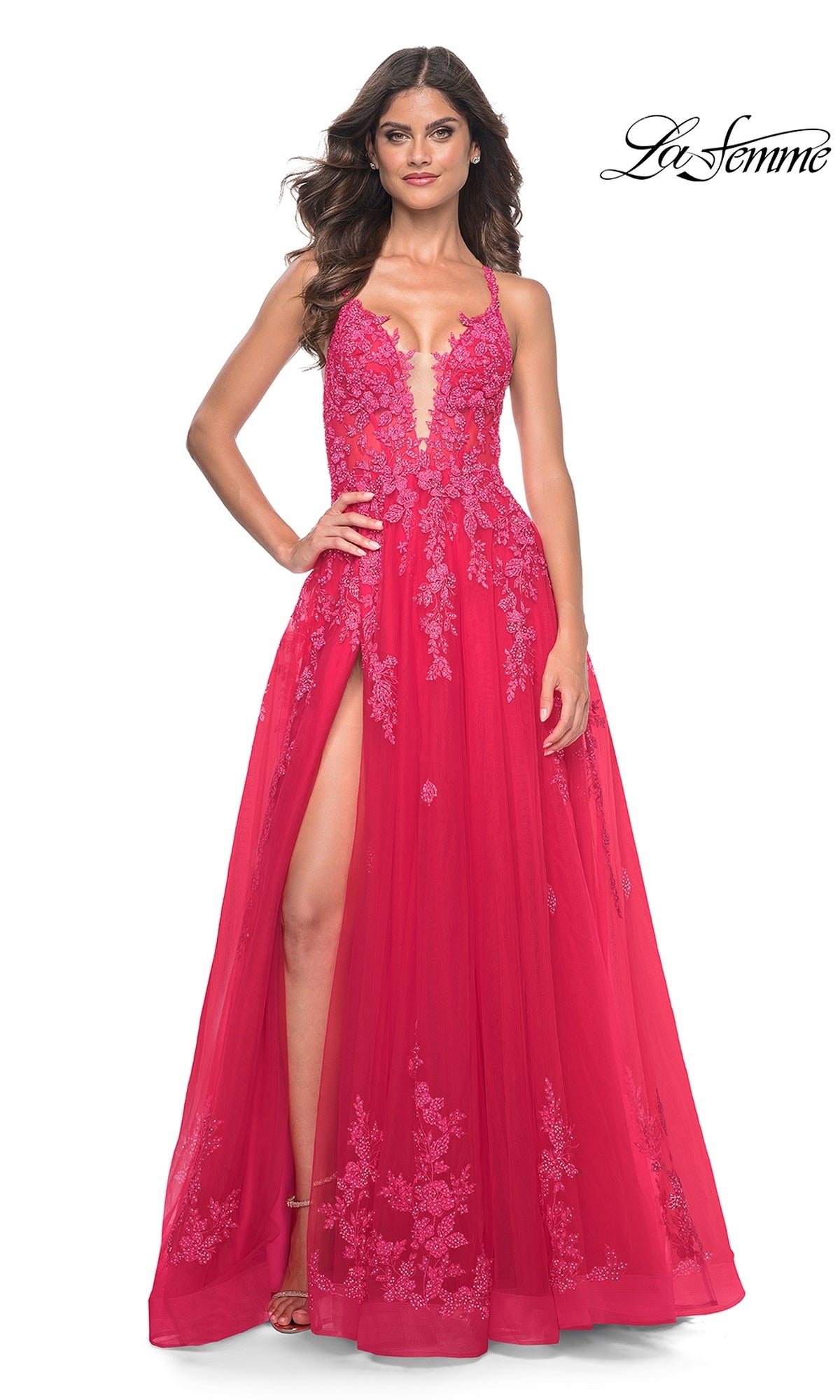 A woman wears the La Femme Embroidered-Lace Long Prom Dress 32062 in deep pink, featuring a sleeveless design, plunging neckline, high leg slit, and embroidered lace. The La Femme logo is shown in the top right corner.