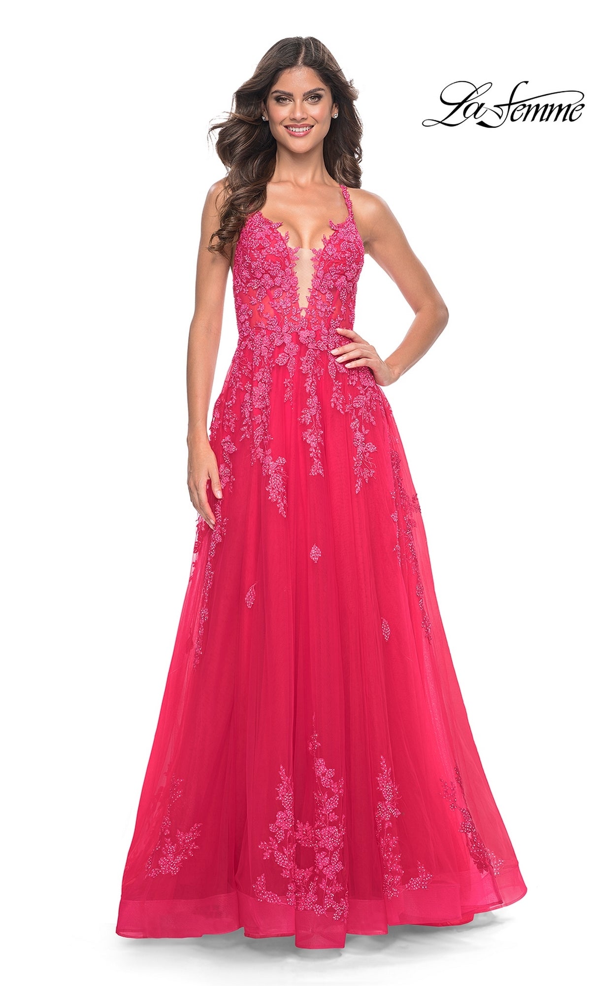 A woman faces forward wearing the La Femme Embroidered-Lace Long Prom Dress 32062 in deep pink, featuring a deep V neckline and intricate lace embroidery. The La Femme logo is displayed in the top right corner.