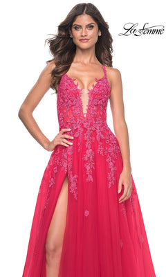 A woman models the La Femme Embroidered-Lace Long Prom Dress 32062—sleeveless, red, with a plunging neckline, thigh-high slit, sheer panels, and lace embroidery. The La Femme brand logo appears in the top right corner.
