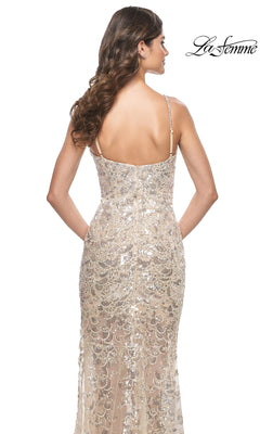 Woman shown from the back in a floor-length, sleeveless La Femme Long Champagne Sequin Prom Dress 32077 with thin straps and sparkling gold details; "La Femme" logo in the top right corner.
