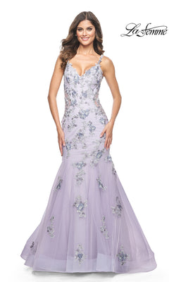 A woman poses against a white background in the La Femme Long Lavender Mermaid Prom Dress 32091, featuring floral embroidery. The La Femme logo is displayed in the top right corner.